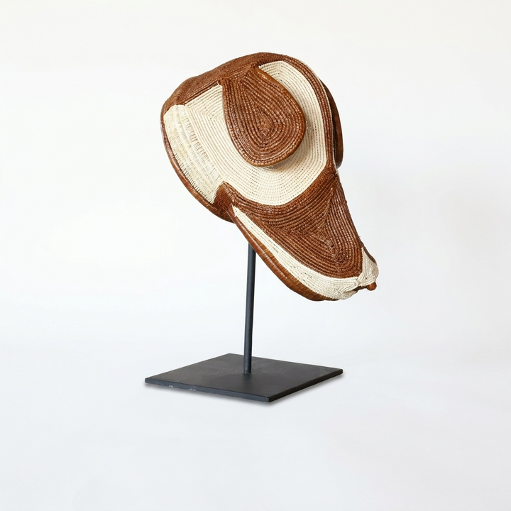 Emberá dog mask alternate view, chestnut and ivory woven palm fiber, Darién Panama