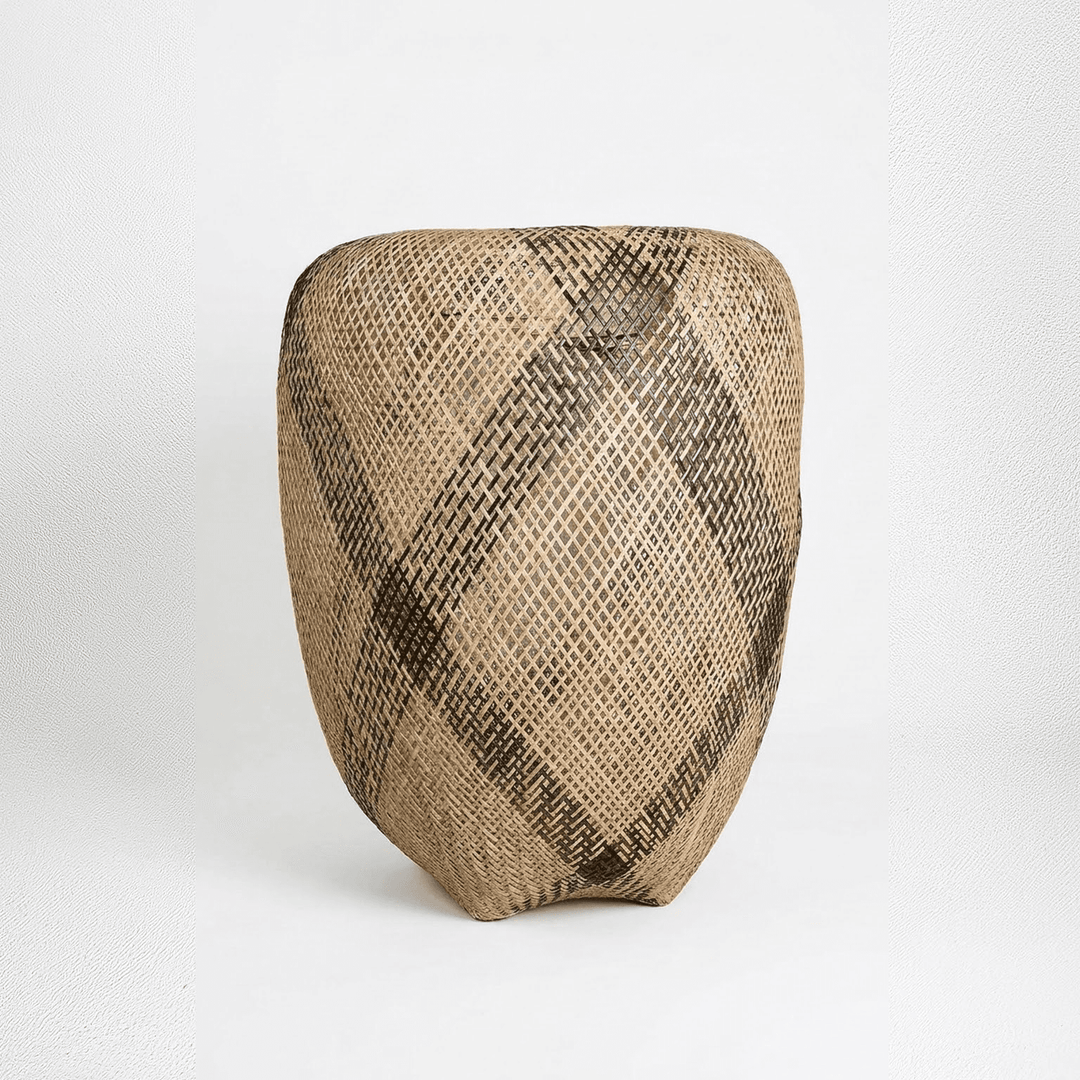 Handmade basket with diagonal sash plaiting pattern showing intricate geometric weaving by indigenous artisans