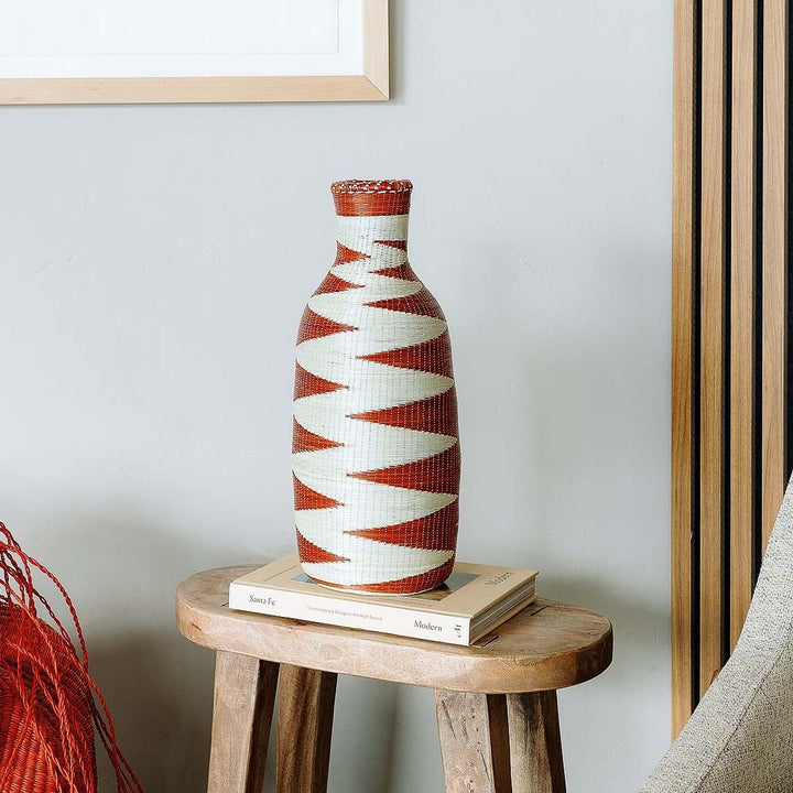 Mini terracotta zigzag woven basket vase by Rwandan artisans with natural elephant grass