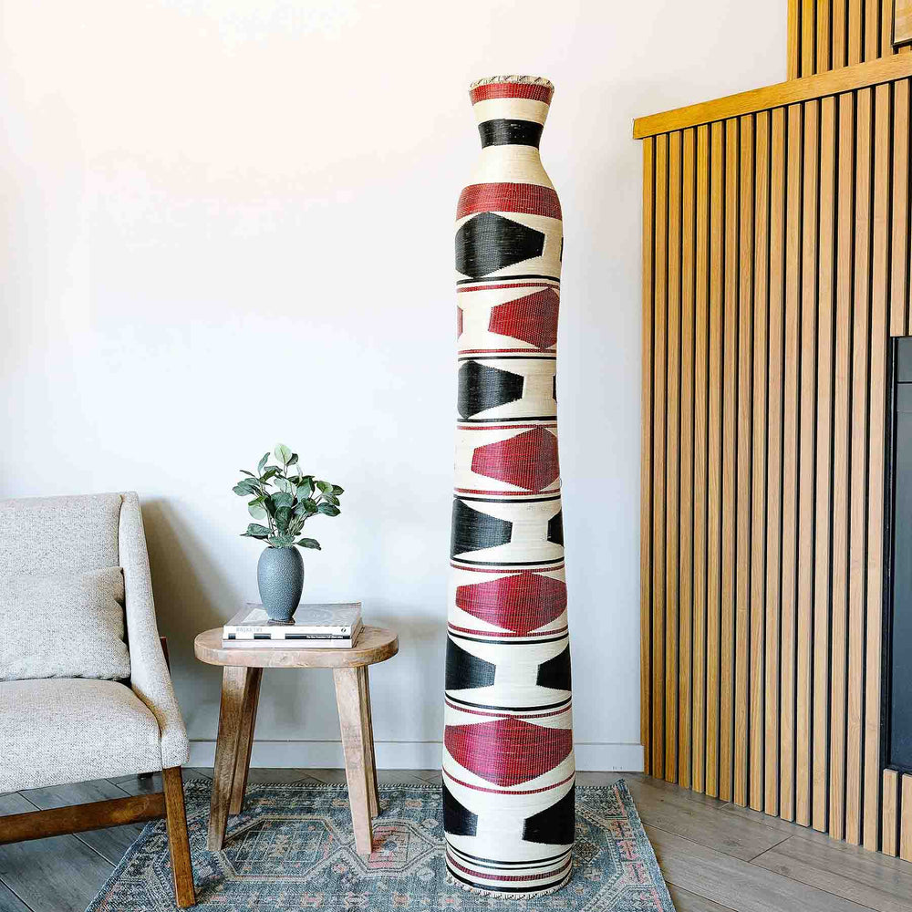 Rwanda unity vessel basket displayed on modern contemporary interior setting