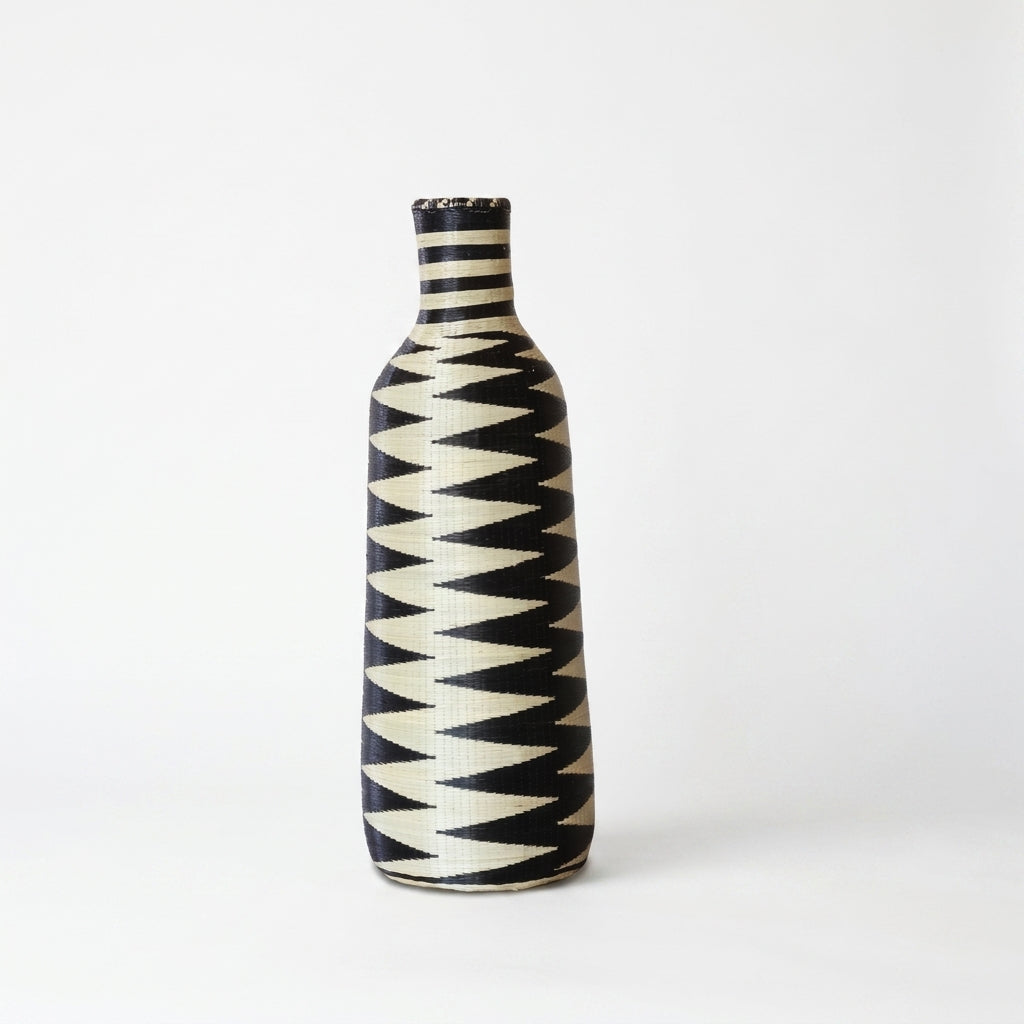Nyanza bottle basket with black and cream sawtooth pattern, on white