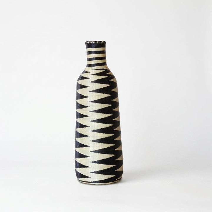 Nyanza bottle basket with black and cream sawtooth pattern, on white