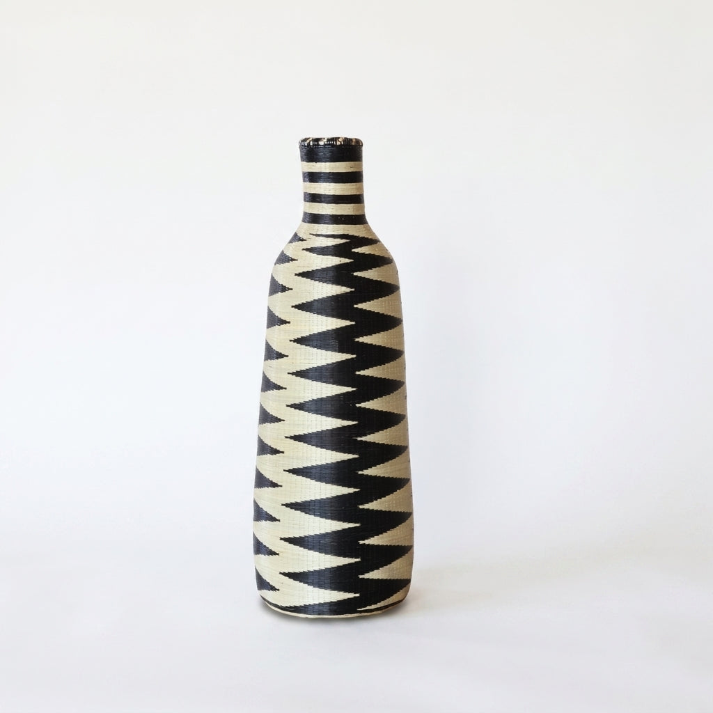 Nyanza bottle basket with black and cream sawtooth pattern, alternate angle on white