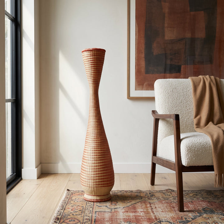 Copper hourglass tower basket styled in a modern living room
