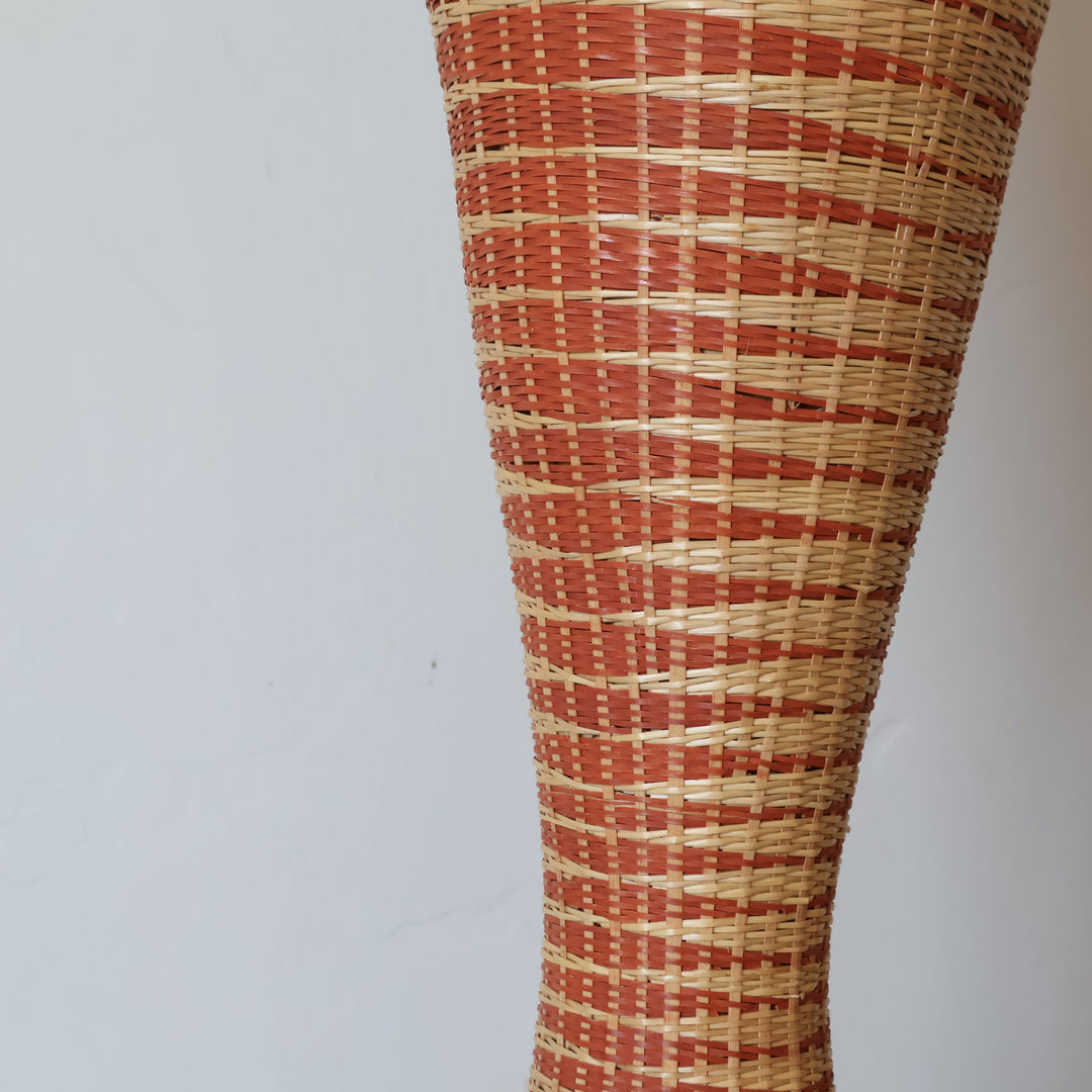 Close detail of the copper and cream grid weave on the hourglass tower basket