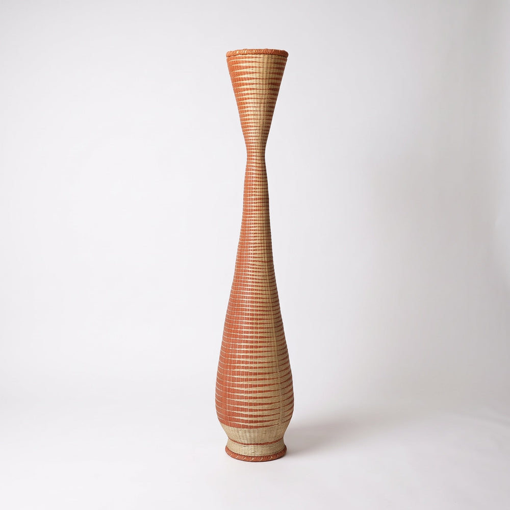 Ombre copper tower basket on soft white studio background