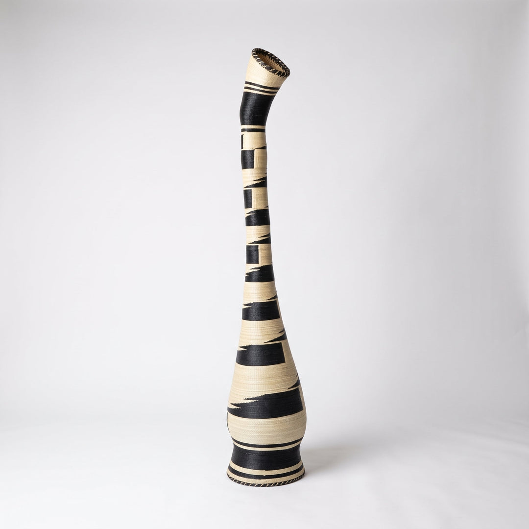 Black and cream swan neck tower basket, alternate angle on soft white studio background
