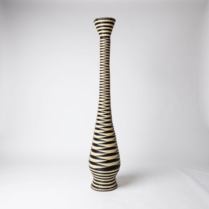 Black and cream zigzag tower basket, alternate angle on soft white studio background