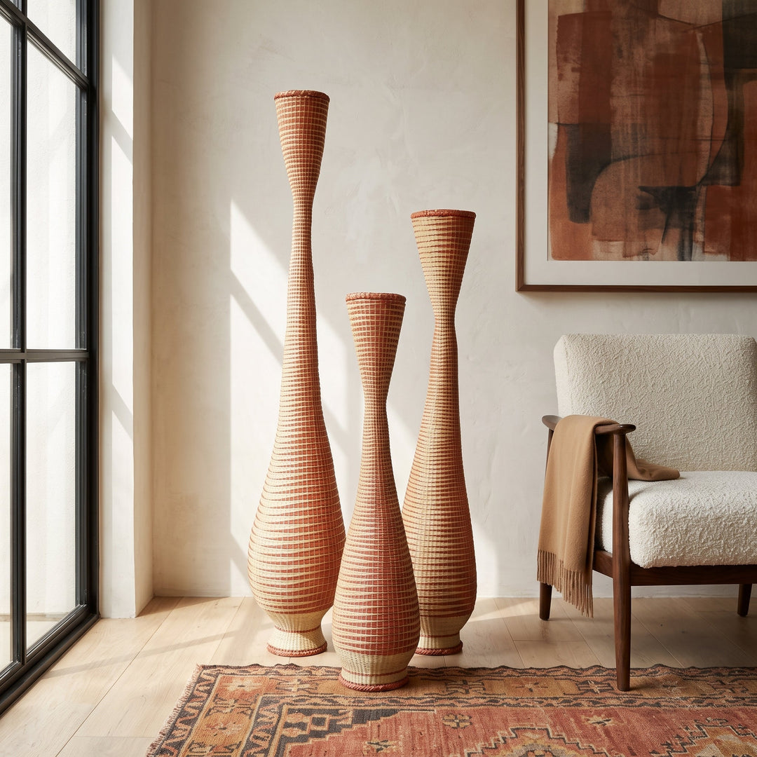 Three copper and cream tower baskets grouped in a modern living room