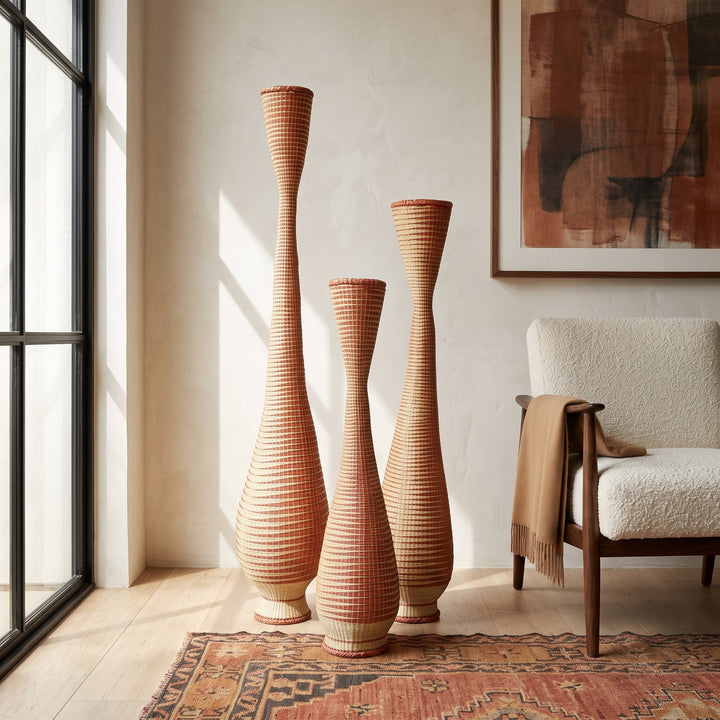 Three copper and cream tower baskets grouped in a modern living room