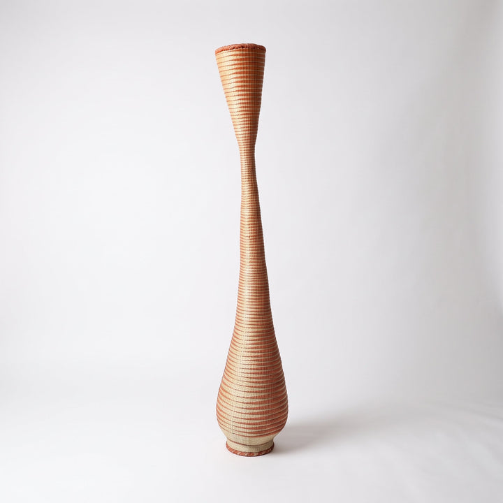 Copper spiral twist tower basket on soft white studio background