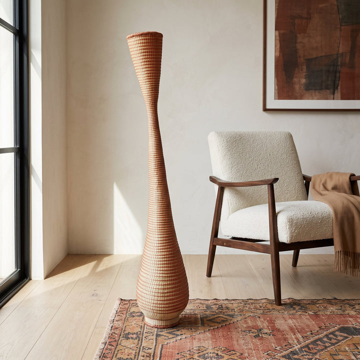 Copper spiral twist tower basket styled in a modern living room