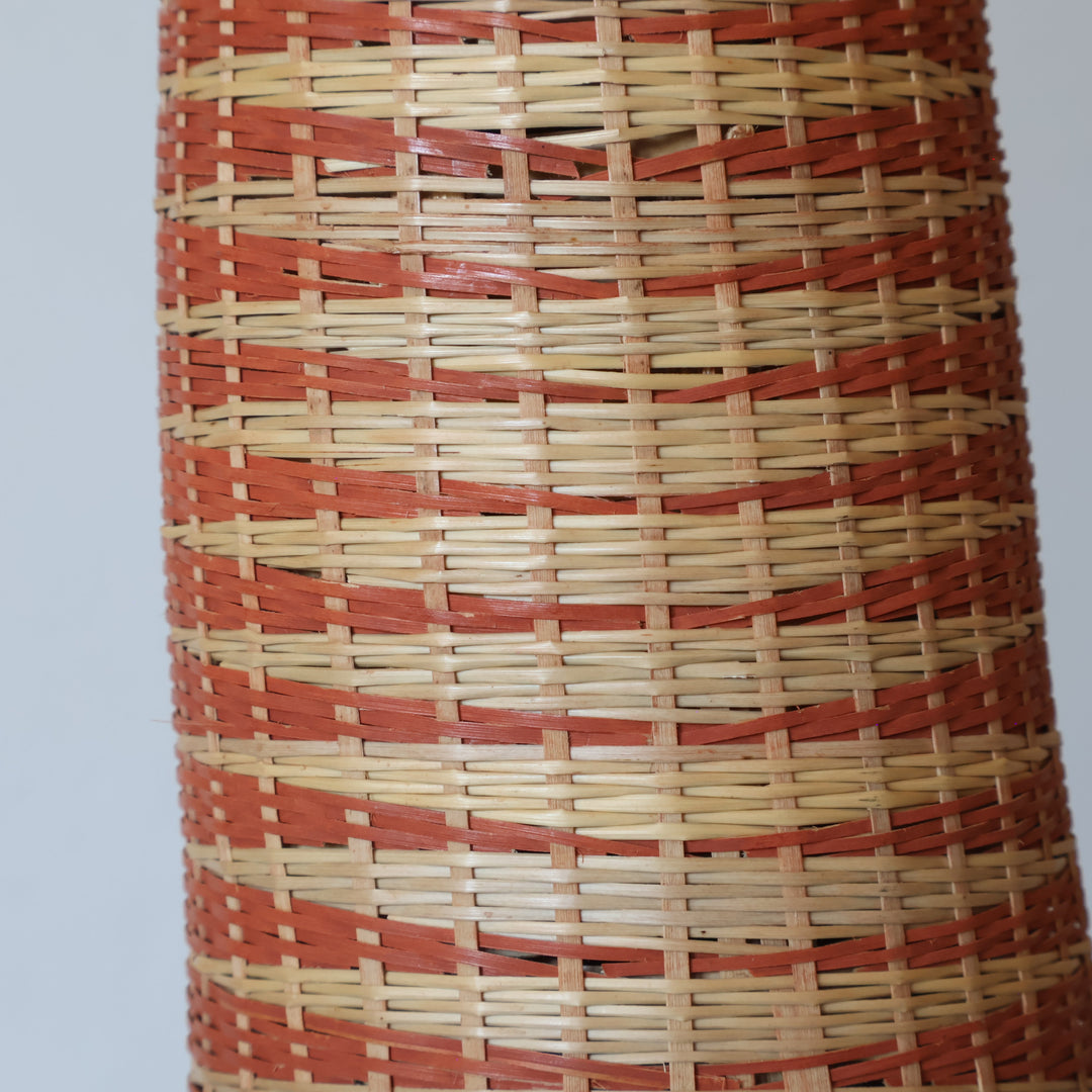 Close detail of the spiraling copper grid weave on the tower basket