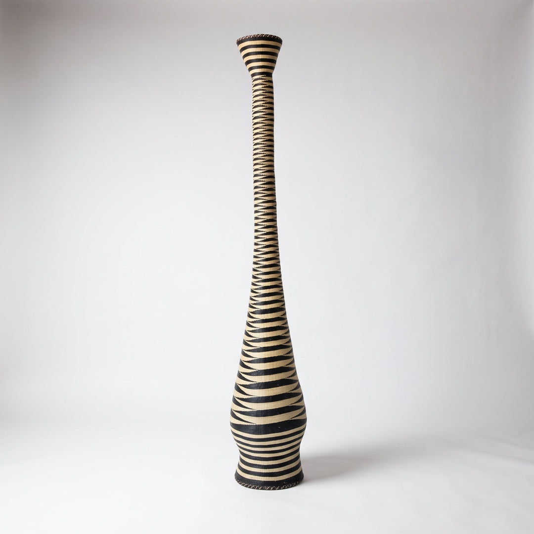 Black and cream ripple tower basket, alternate angle on soft white studio background