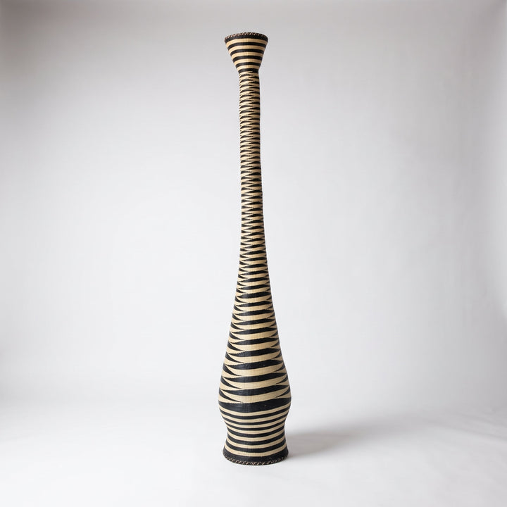 Black and cream ripple tower basket, alternate angle on soft white studio background