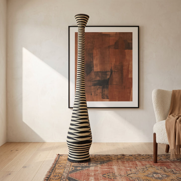 Black and cream ripple tower basket styled in a modern living room