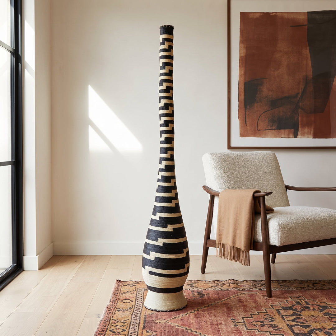 Stepped black and cream tower basket styled in a modern living room