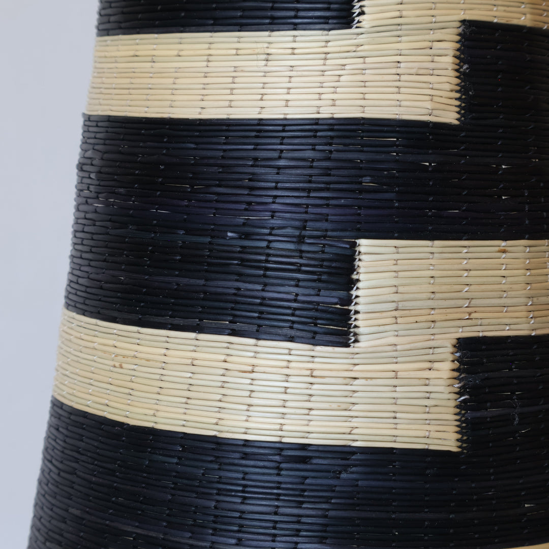 Close detail of the stepped black blocks on the tower basket
