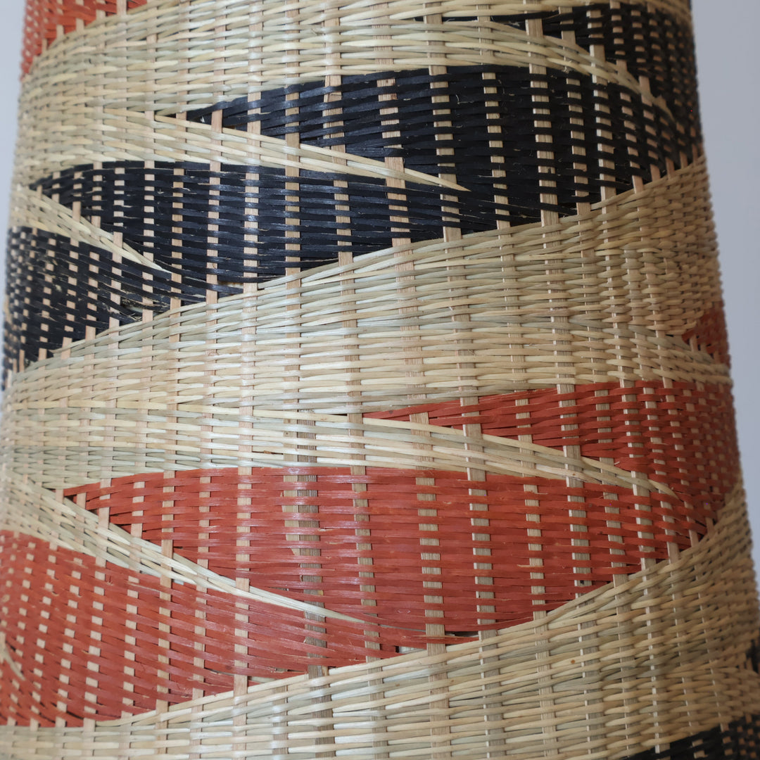 Close detail of the terracotta and black ribbons on the tower basket