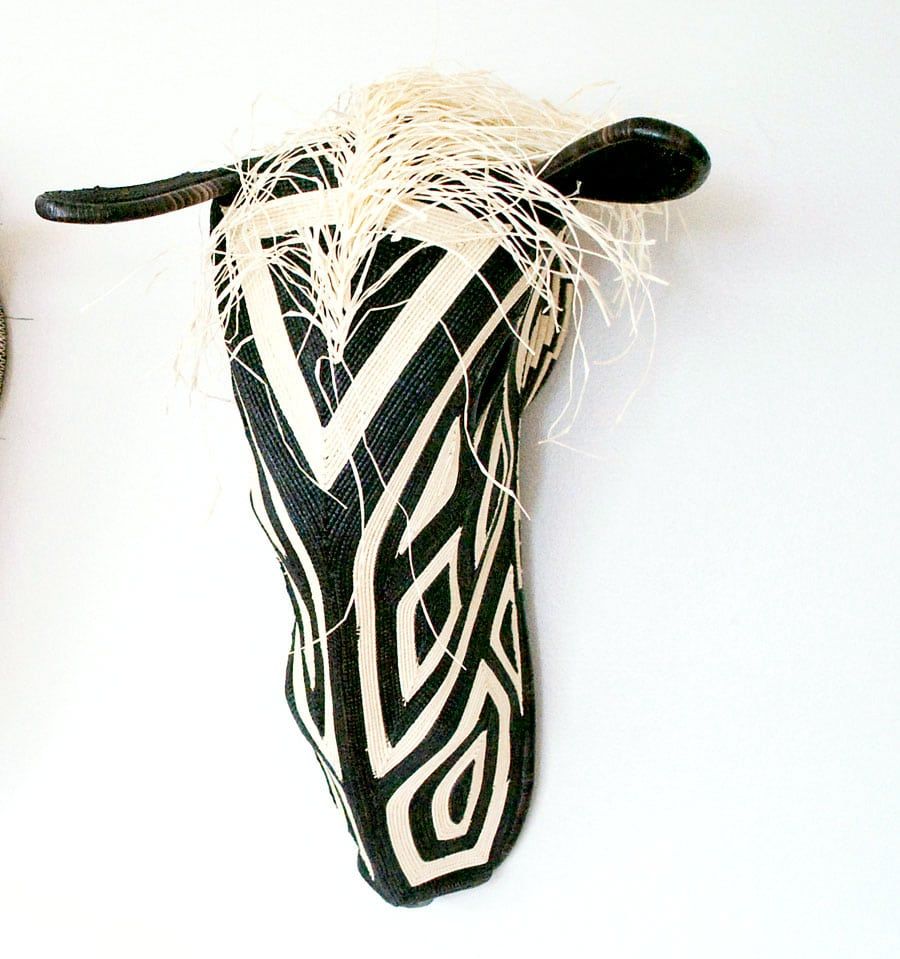 Large white-haired horse mask with riverstripe patterns by Embera artisans