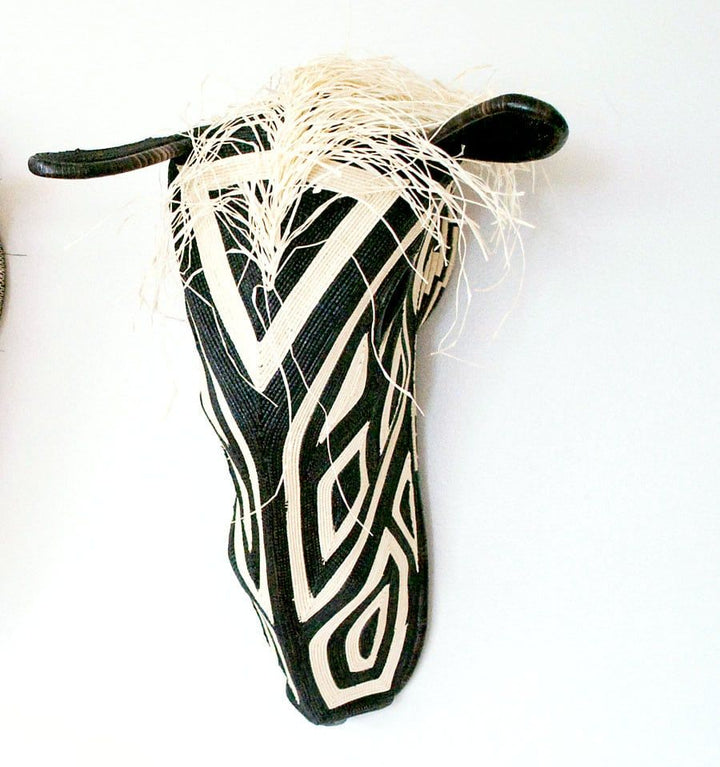 Large white-haired horse mask with riverstripe patterns by Embera artisans