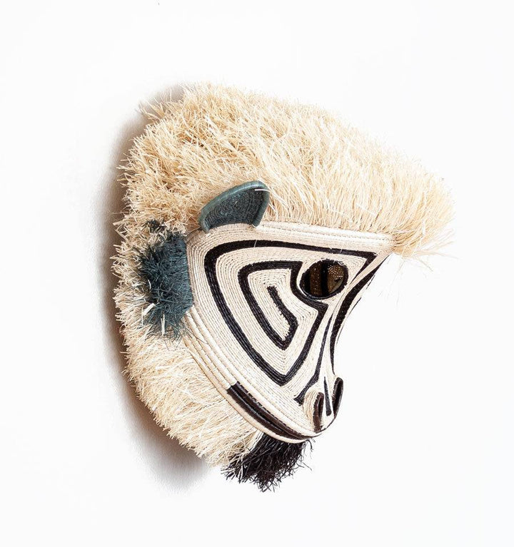 Side profile view of Embera white spirit monkey animal mask showing dimensional woven construction