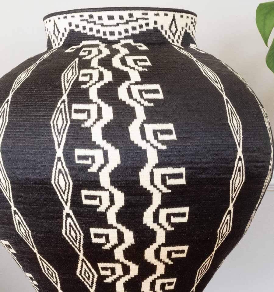 Close-up detail of the weave on the Tapered Columns on Black Wounaan basket from Panama