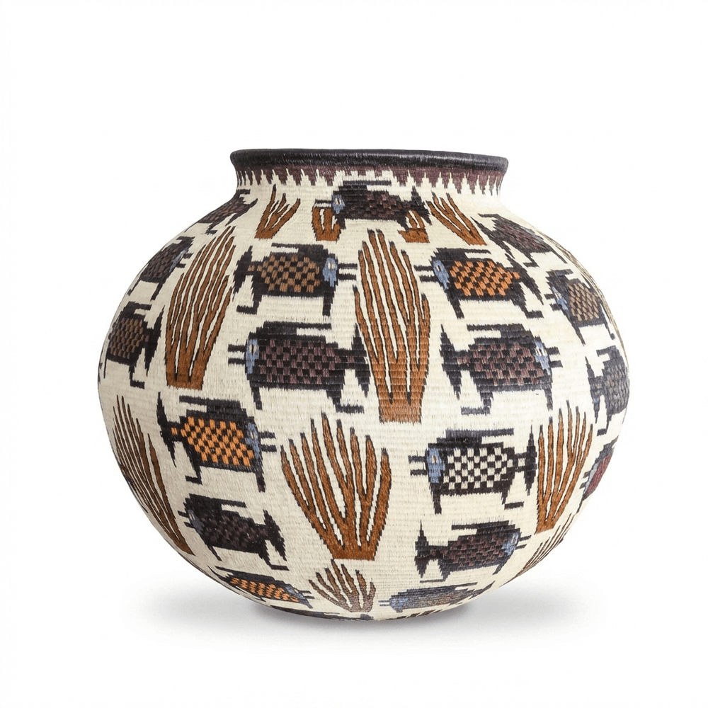 Large decorative Wounaan basket with dotted fish pattern in coral tones handwoven from chunga palm Panama