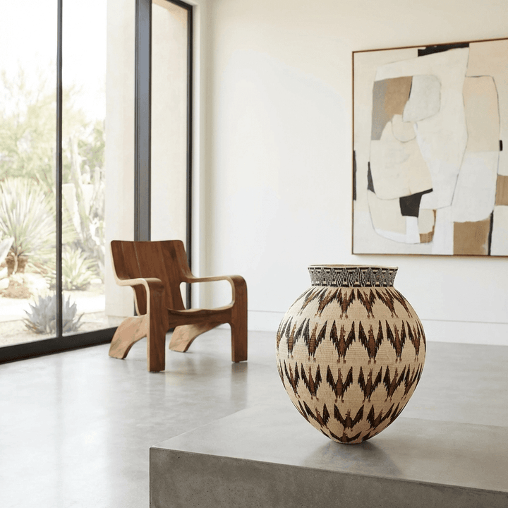 Wounaan eblinas bats basket displayed as accent decorr in modern interior setting
