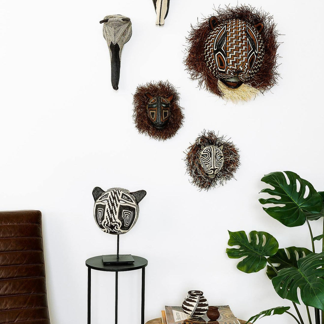 Embera mask displayed on modern wall as sophisticated tribal art decor in contemporary interior