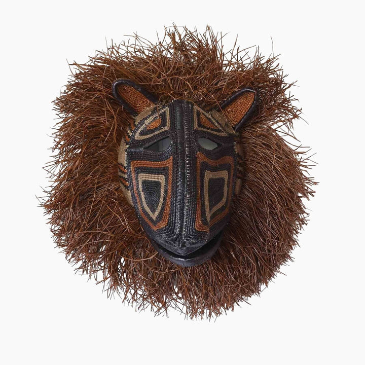 Handwoven Emberá spirit cat mask with geometric patterns in natural palm fiber