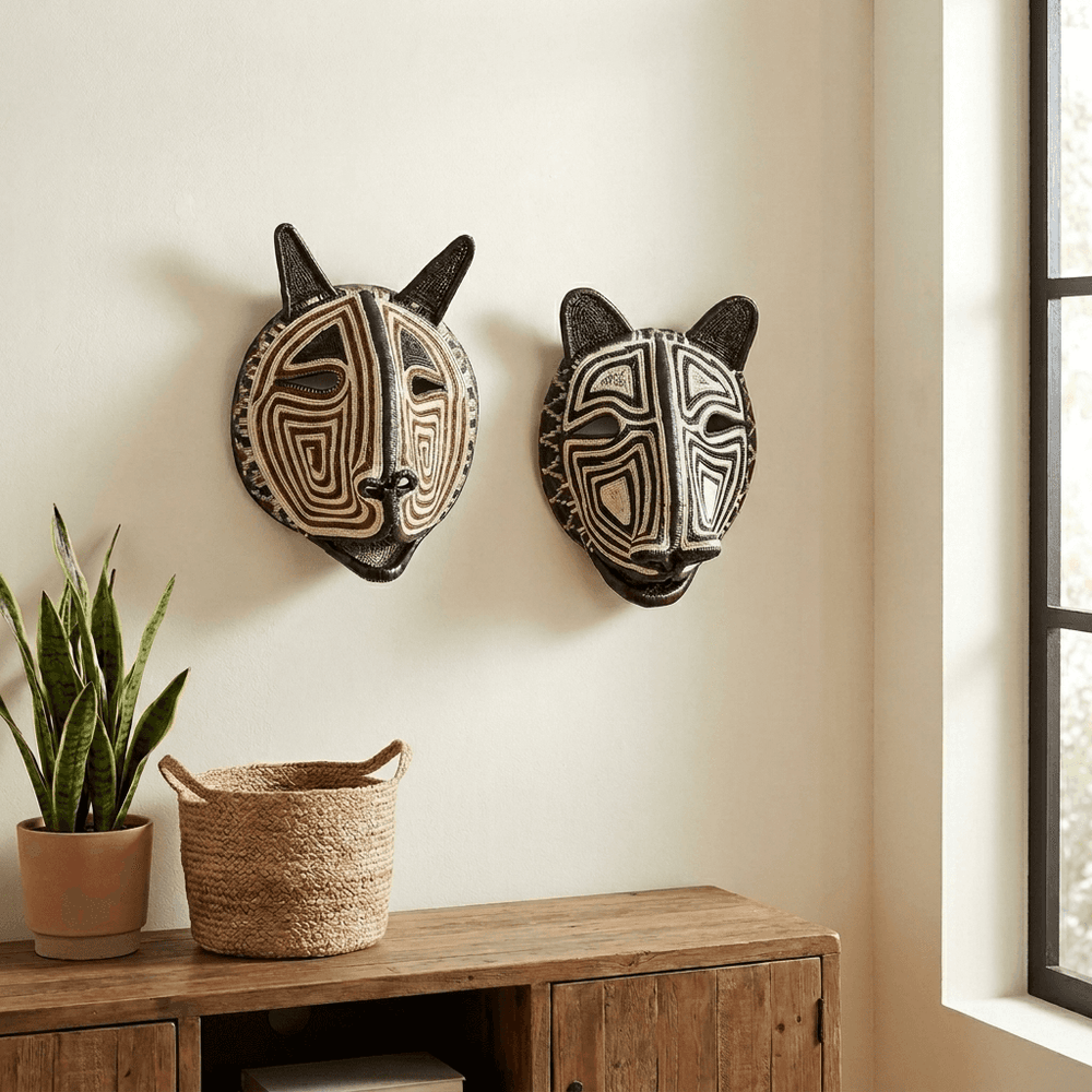 handwoven masks displayed on plain wall in a modern tribal interior