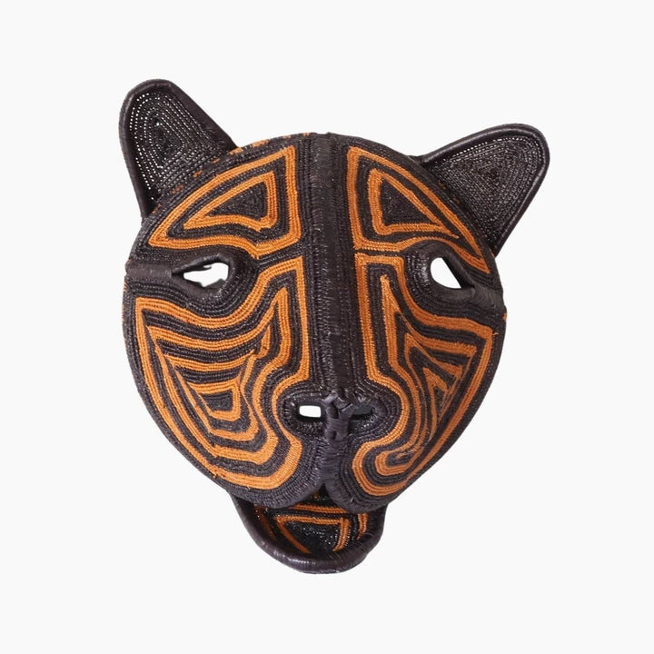Handwoven Embera cat mask in natural palm fiber with jaguar features by Panama artisans