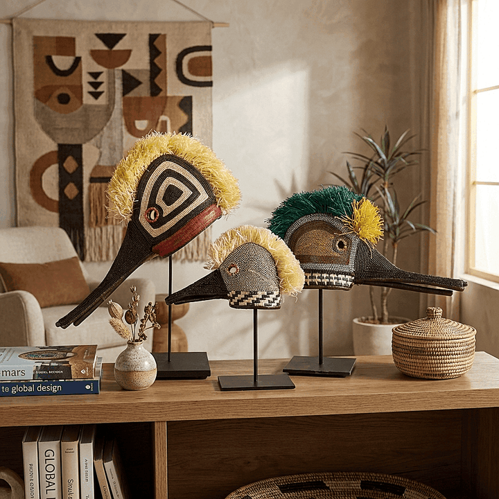 Embera hummingbird ceremonial mask displayed on modern console with ethnic decor collection