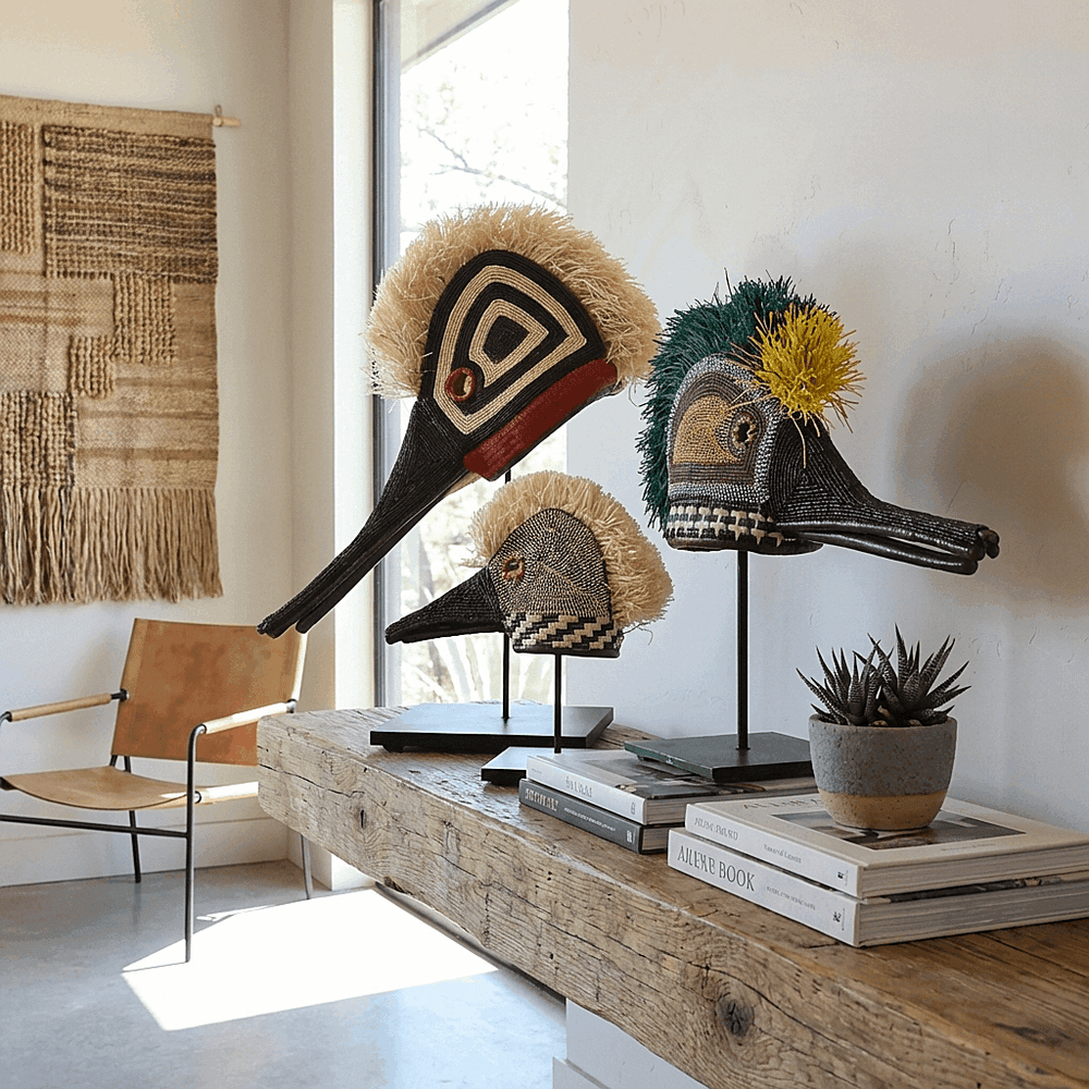 Embera hummingbird ceremonial mask displayed on modern console with ethnic decor collection