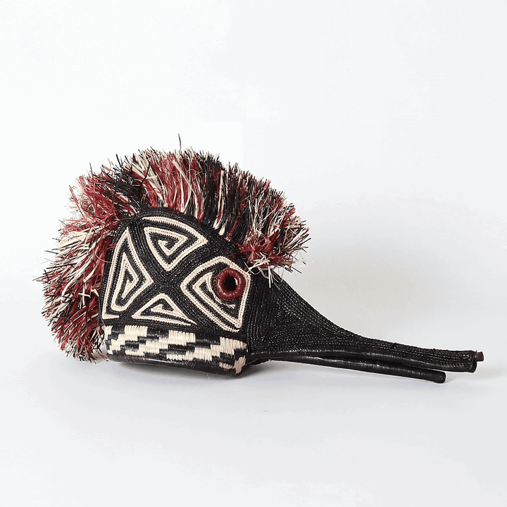 Crimson and black hummingbird ceremonial mask by Embera artisans from Panama Darién rainforest