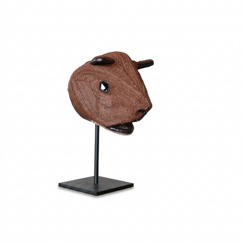 Handwoven Emberá brown bear mask in warm reddish-brown palm fiber, from Panama