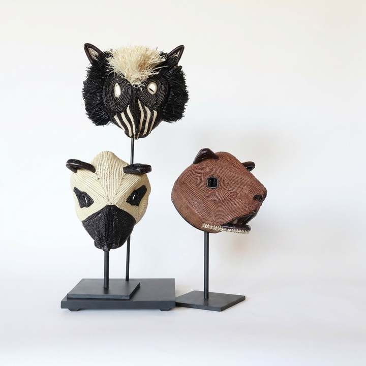 A group of handwoven Emberá animal masks shown together, Darién Panama