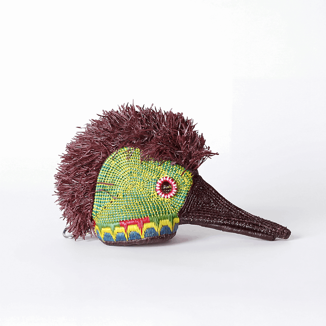 Tiny green hummingbird ceremonial mask handwoven by Embera artisans from Panama