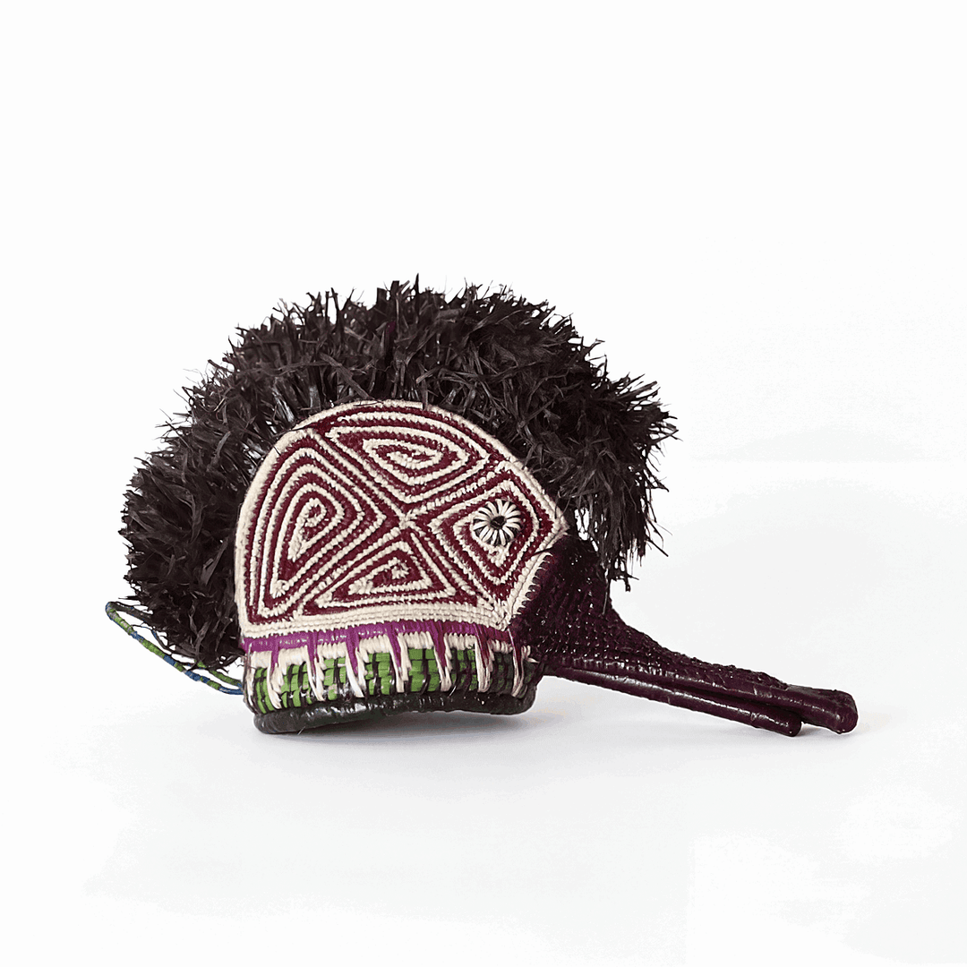 Tiny ceremonial mask with purple swirl hummingbird design by Embera artisans from Panama