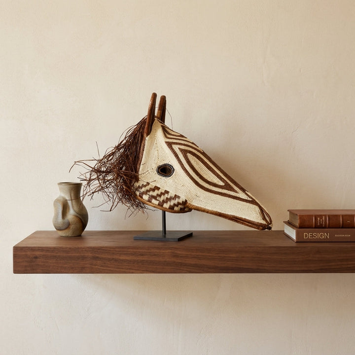Chevron horse mask on shelf, ivory with brown zigzag patterns, handwoven Emberá art