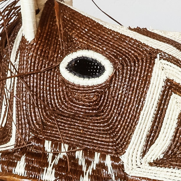 Detail of cream triangle weave on chestnut Emberá horse mask