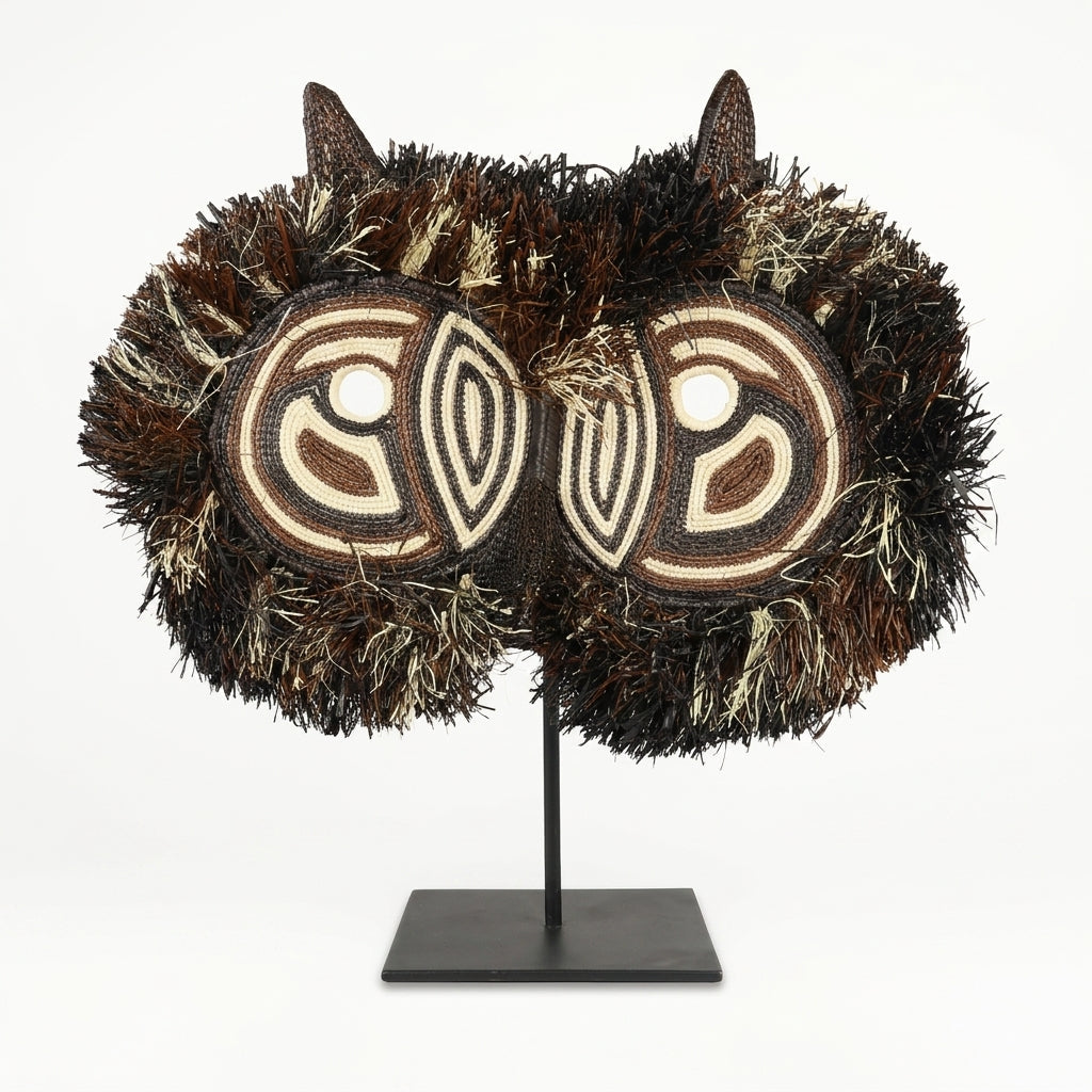Handwoven Emberá owl mask, cream, chestnut and charcoal facial discs with cowrie-shell eyes, from Panama