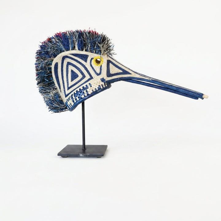 Handwoven Emberá hummingbird mask in cobalt blue and ivory with a long beak, from Panama