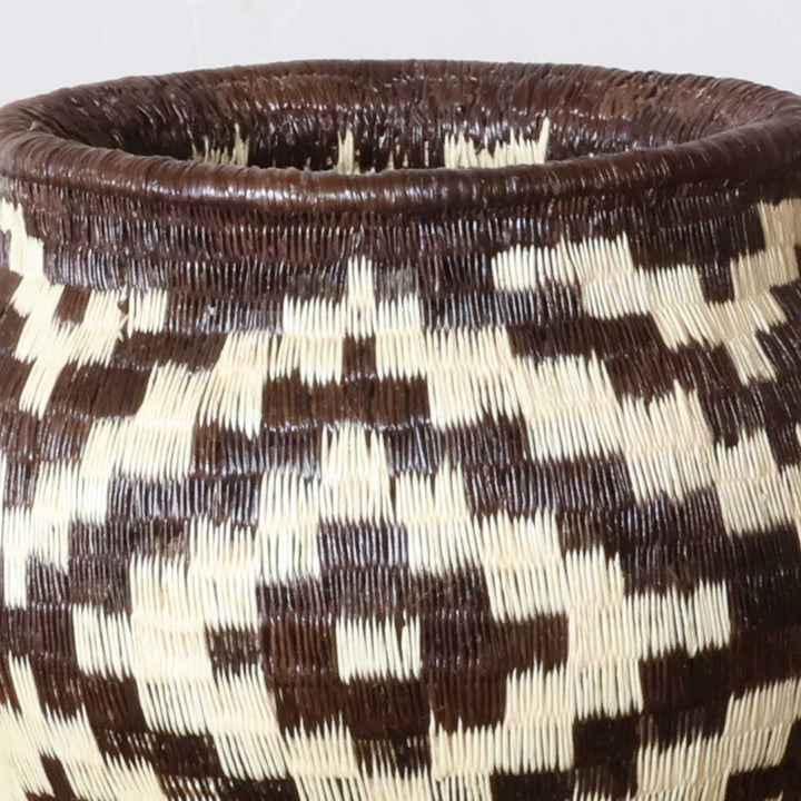 Close-up werregue palm fiber diamond weave pattern detail on authentic Wounaan basket