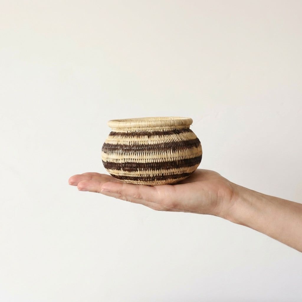 Small handwoven mini basket with vintage black stripe pattern by indigenous artisans