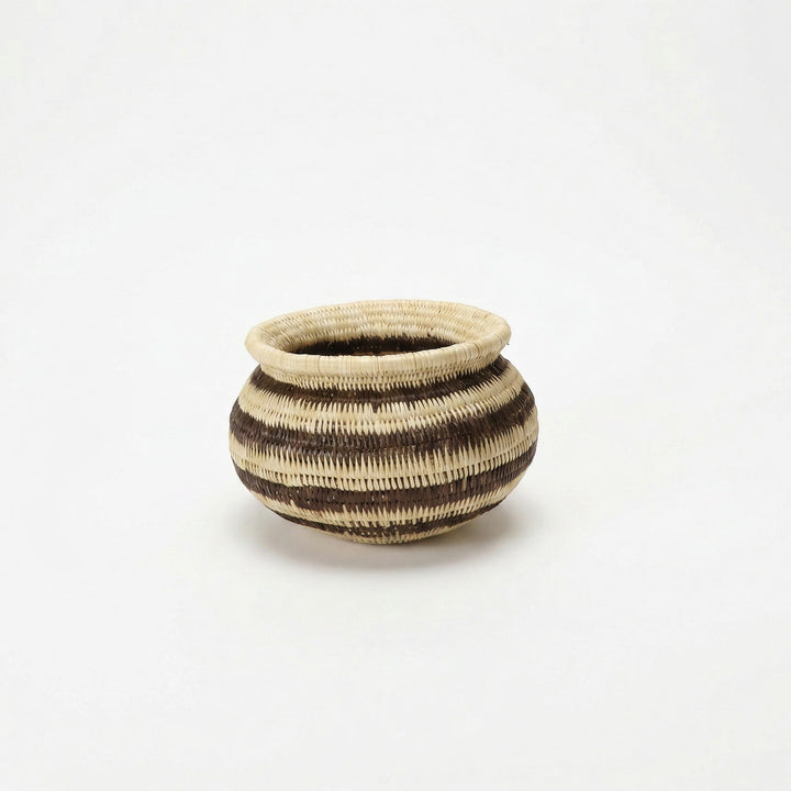 Small handwoven mini basket with vintage black stripe pattern by indigenous artisans