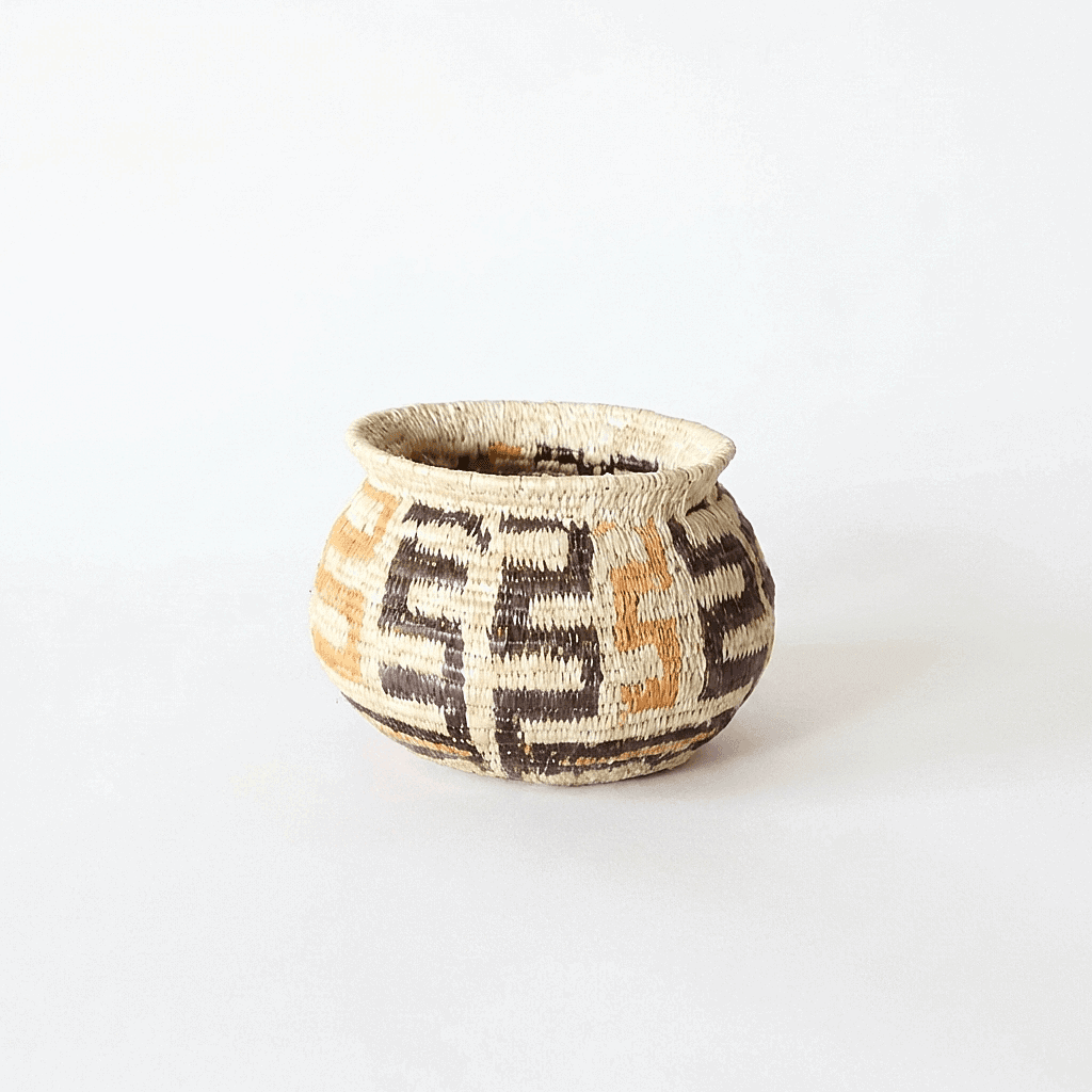 Small woven basket black orange ladder pattern by Wounaan artisans from Panama Darién rainforest