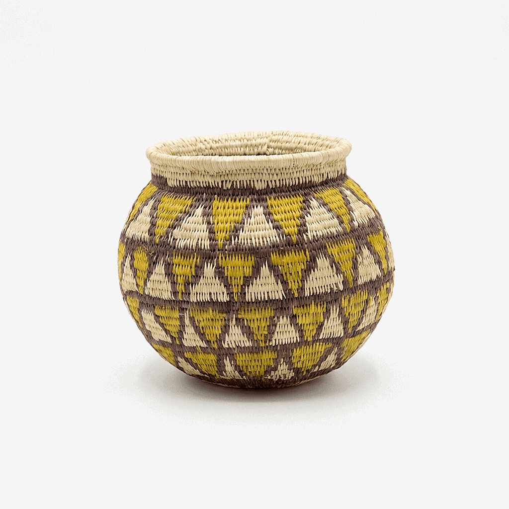 Small handmade basket golden diamond pattern black border indigenous woven palm fiber art