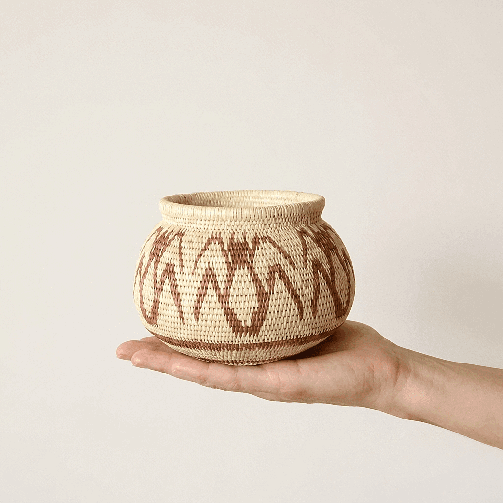 Small vintage brown werregue palm basket with intricate ant motifs by Wounaan artisans from Panama
